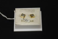 Lot 25 - A pair of 18ct gold four stone diamond princess cut cluster earrings