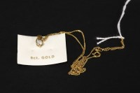 Lot 33 - A 9ct yellow gold single stone diamond pendant