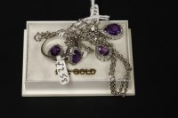 Lot 37 - A 9ct white gold pear shaped amethyst and diamond cluster pendant
