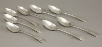 Lot 127 - A set of eight George IV silver fiddle and shell pattern table spoons