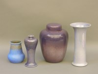Lot 262 - A Ruskin pottery purple lustre glaze jar and cover
