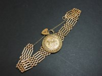 Lot 92 - A 9ct gold five row gate bracelet