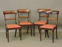Lot 542 - A set of four mahogany bar back single dining chairs