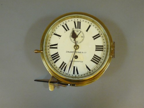 Lot 325 - A thirty day brass ship's clock