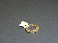 Lot 4 - A 9ct yellow gold diamond set half eternity ring