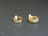 Lot 6 - Two 9ct yellow and white gold diamond set band rings