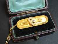 Lot 74 - A late Victorian 15ct gold diamond and split pearl brooch