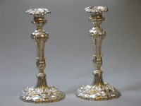 Lot 435 - A pair of 19th century silver plated candlesticks