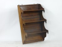 Lot 724 - A set of George III fruitwood wall shelves