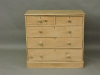 Lot 703 - A pine five drawer chest of drawers