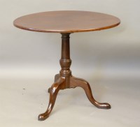 Lot 634 - A George III mahogany tripod table