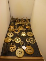 Lot 406 - Horse brasses on leather straps and loose