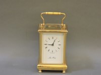 Lot 231 - A 20th century brass carriage clock