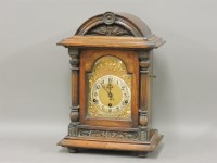 Lot 315 - A late Victorian mahogany three train mantel clock