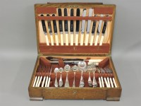 Lot 340 - A 1930s oak cased canteen of silver plated cutlery