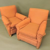 Lot 648 - A pair of Victorian red re-upholstered armchairs