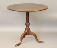 Lot 563 - A 19th century oak tripod table