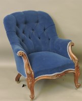 Lot 704 - A Victorian rosewood armchair