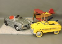 Lot 455 - A modern yellow tin toy pedal car