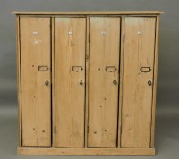 Lot 597 - A Victorian stripped pine four section locker