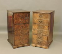 Lot 702 - A pair of modern reproduction mahogany three drawer filing cabinets