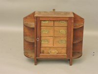 Lot 609 - A walnut hanging wall cupboard