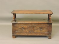 Lot 571 - An early 20th century oak monk's bench