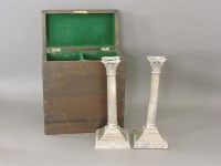 Lot 212A - A pair of Georgian style silver corinthian column candlesticks
