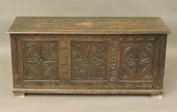 Lot 606 - A 1920s carved oak coffer