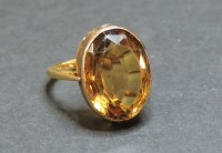 Lot 57 - A single stone citrine/cairngorm ring