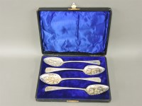 Lot 194 - A cased set of four Georgian berry spoons