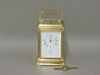 Lot 223 - A French brass carriage clock