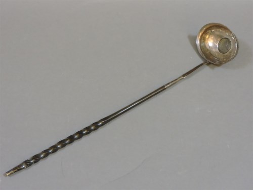 Lot 196 - A Georgian silver coin toddy ladle