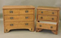 Lot 660 - An Arts and Crafts oak chest of drawers