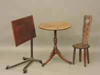 Lot 673 - A 19th century mahogany tripod table