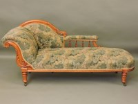 Lot 574 - A Victorian oak chaise longue