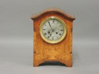 Lot 475 - An Edwardian inlaid mantel clock