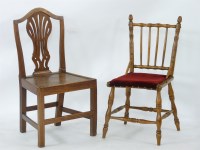 Lot 655 - An elm chair