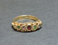 Lot 10 - A 9ct gold diamond and gemstone set DEAREST ring