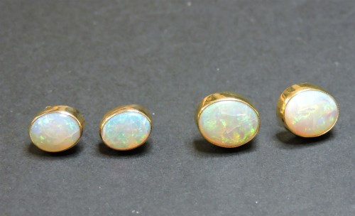 Lot 42 - A pair of single stone opal earrings