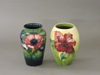 Lot 221 - Moorcroft and pottery 'Hibiscus' and 'Anemone' vases