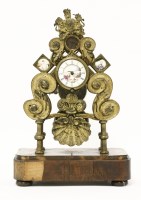 Lot 407 - A brass skeleton clock