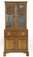 Lot 541 - A George III mahogany secretaire bookcase