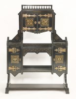 Lot 460 - An American Aesthetic ebonised cabinet