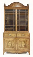 Lot 523 - A George III inlaid mahogany bookcase