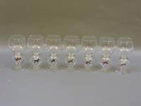 Lot 306 - A set of seven glass hunting goblets