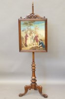 Lot 583 - A Victorian mahogany pole screen