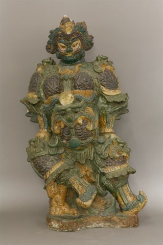 Lot 21 - A large earthenware Roof Guardian