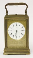 Lot 411 - A brass carriage clock