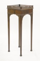 Lot 565 - A George III-style mahogany kettle stand